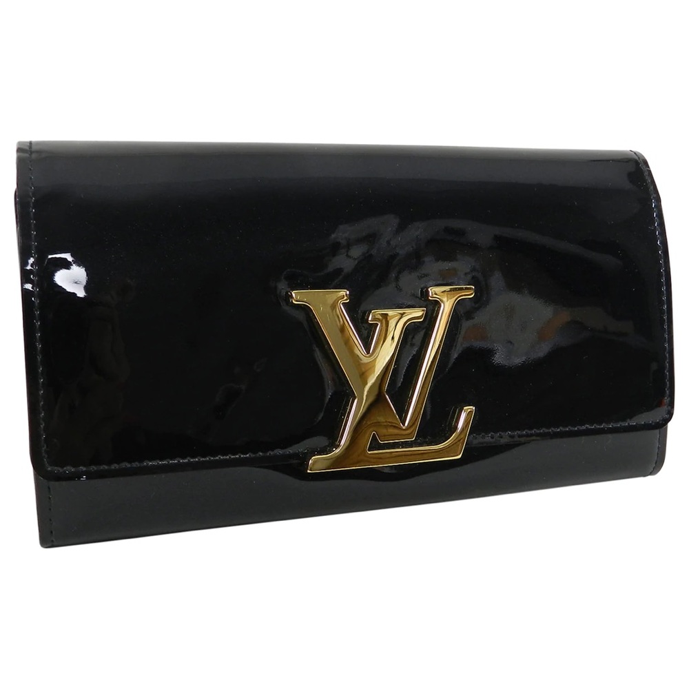 Luis Vuitton patent leather wallet.